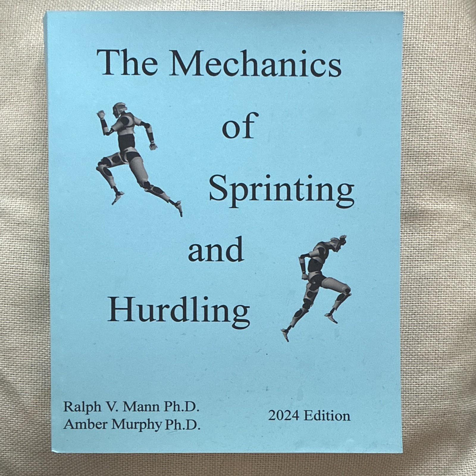 The Mechanics of Sprinting and Hurdling by Dr. Ralph Mann Ph.d. 2024 Edition.