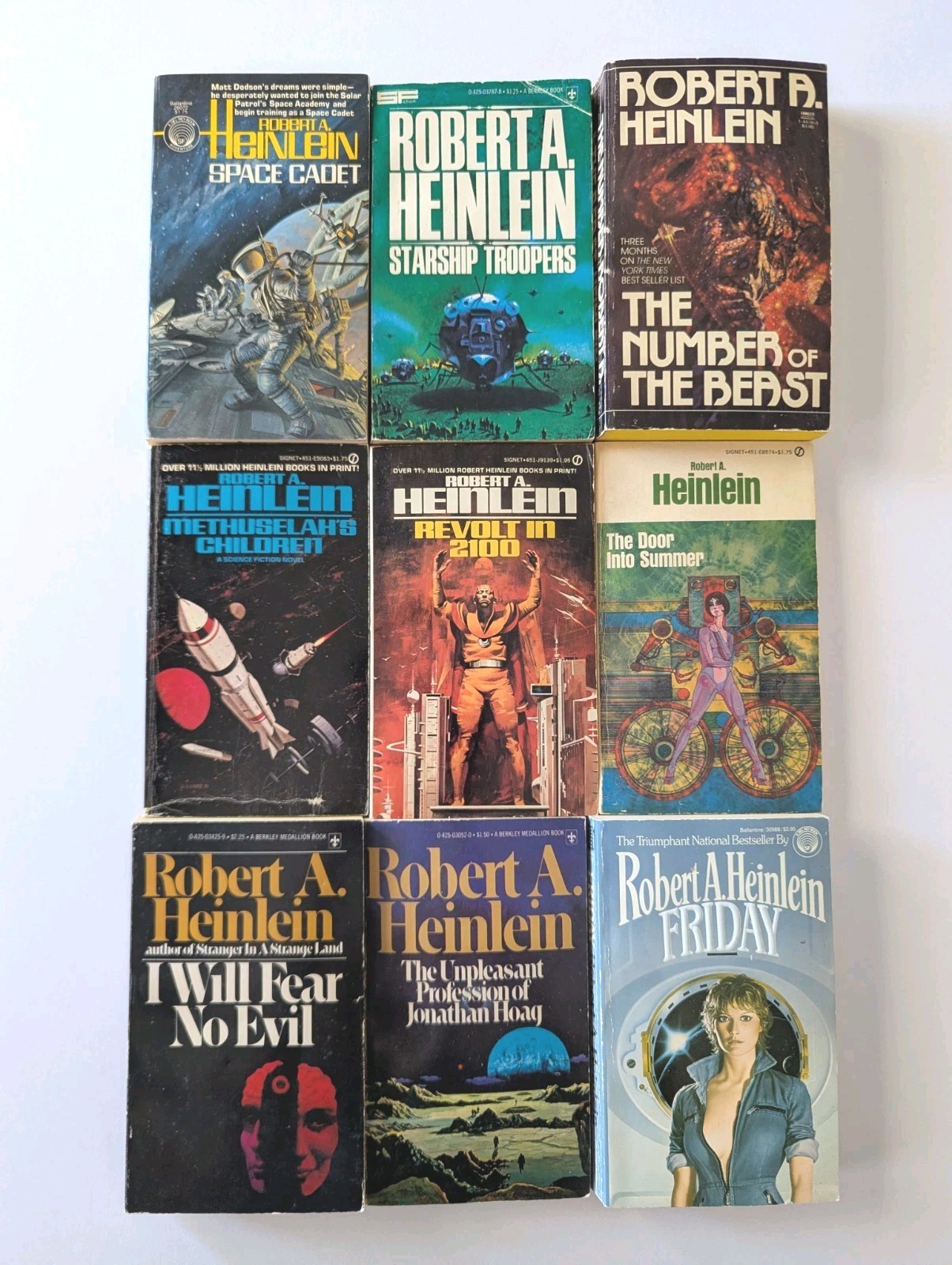 9 BOOK LOT Robert A Heinlein Sci-Fi Paperback Starship Troopers Revolt Space VTG